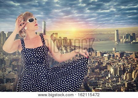 New York city skyline with surise in background. Pin up girl in first plan.