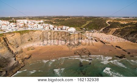 People rest on the beach naer Zambujeira de Mar, Portugal