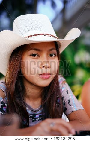Beautiful Asian girl with a hat !