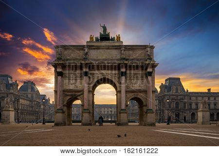 Arc de Triomphe at the Place du Carrousel in Paris at sunrise