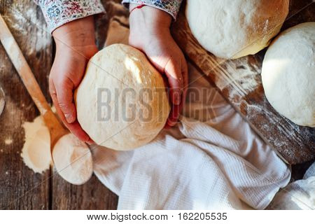 Close Up View Of Baker Kneading Dough. Homemade Bread. Hands Pre