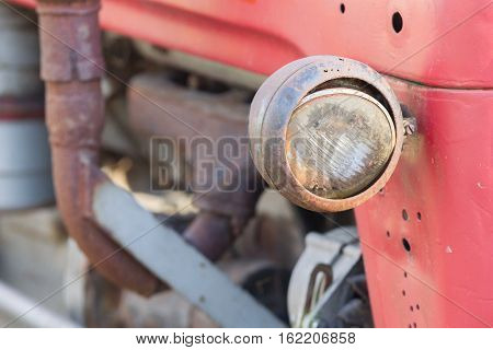 Old Tractor Face, Selective Focus On It's Light