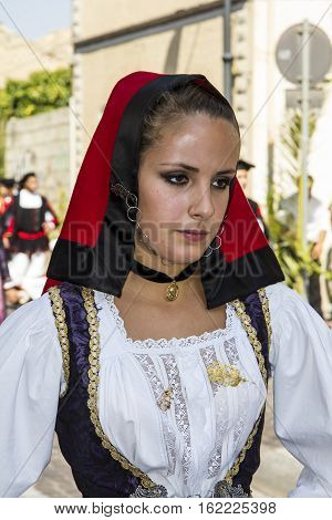 SELARGIUS, ITALY - September 9, 2012: Former marriage Selargino - Sardinia - portrayed a beautiful girl in traditional Sardinian costume
