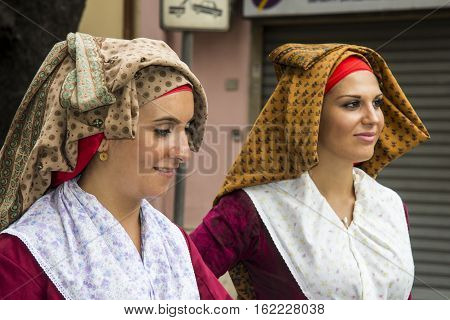 QUARTU S.E., ITALY - September 15, 2013: Wine Festival in honor of the celebration of St. Helena - Sardinia - of beautiful women portrait of the folk group Sant'Agata  of Santadi
