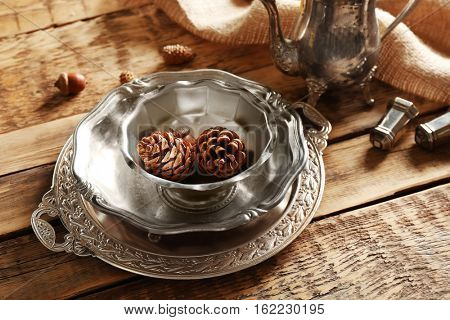 Set of dinnerware on wooden table