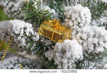 New Year's toys and a garland on a Christmas tree