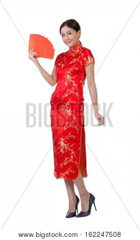 Chinese woman dress in traditional qipao and hold red envelope with money