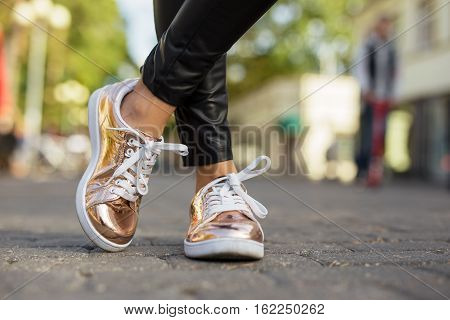 Street style shinny womans shoes in the city