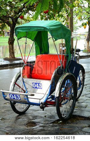 Cyclo (rickshaw) On Street In Hoi An, Vietnam