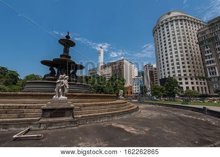 Empty Fountain at the Mahatma Gandhi Square and View of Office Buildings of Rio de Janeiro under the Clear Blue Sky
