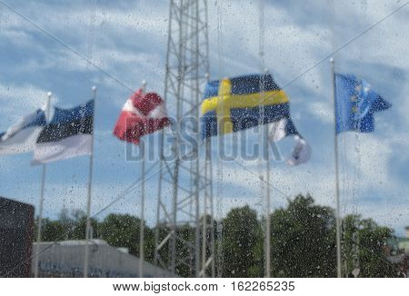 Scandinavian flags (Finland Estonia Latvia Sweden) and UE flag floating in the air