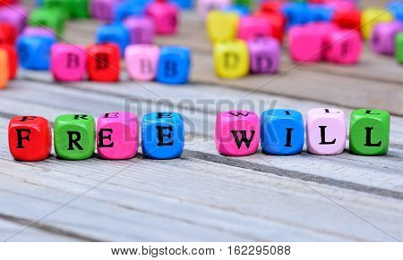 Free will words on gray wooden table