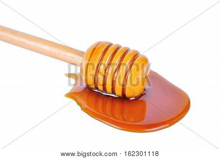 Honey with dripper isolated on white background