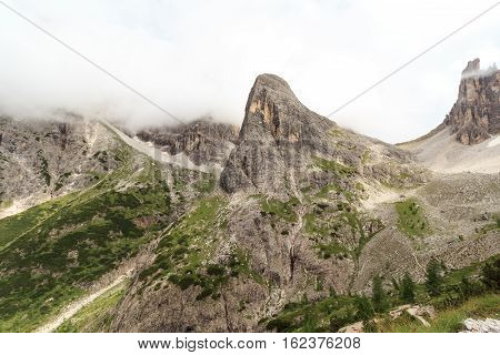 Sexten Dolomites Mountain Hohe Leist In Clouds In South Tyrol, Italy