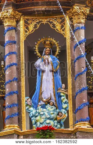 SAN MIGUEL DE ALLENDE, MEXICO - DECEMBER 28, 2014 Mary Statue Basilica Christmas Convent Immaculate Conception The Nuns San Miguel de Allende Mexico. Convent of Immaculate Conception was created in 1754.