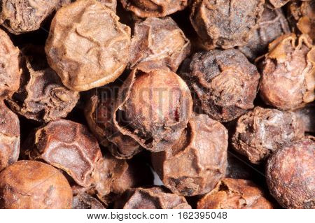 closeup view of black dried pepper corns