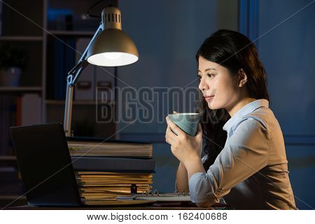 Asian Business Woman Drink Coffee Refreshing Working Overtime Late