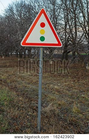 Road sign warning about traffic light regulation of the European standard