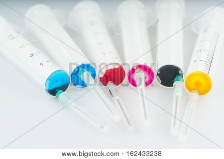 Six syringe with liquid ink and needles