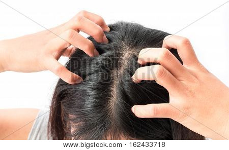 Closeup woman hand itchy scalp Hair care concept