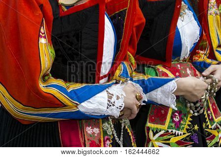 CAGLIARI, ITALY - May 1, 2016: 360 ^ Sant'Efisio Festival - Sardinia - detail of a female traditional Sardinian costumes