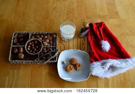 Flatlay of santa taking a refreshment background with milk and cookies