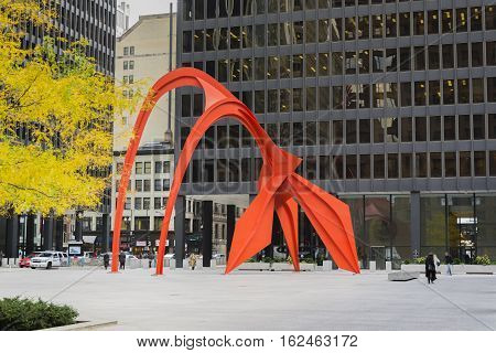 Chicago IL USA october 27 2016: Red Flamingo sculpture created by artist Alexander Calder in 1973 located in the Federal Plaza in Chicago Illinois US
