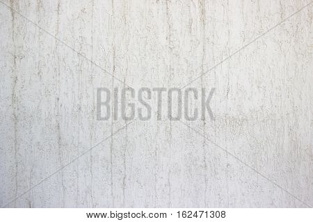Textured plaster decoration of a residential building in white