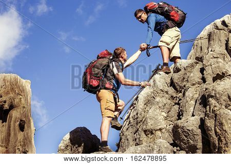 Help support and help in a dangerous situation to hike in the mountains.