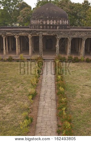 MANDU, INDIA - NOVEMBER 17, 2008: Interior courtyard of the Malik Mughith's Mosque inside the hilltop fortress town of Mandu in Madyha Pradesh, India. Built circa 1432 by Malik Mughith.