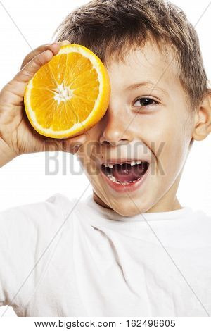 little cute boy with orange fruit double isolated on white smiling without front teeth adorable kid cheerful close up