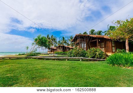 Cayo Guillermo island, Sercotel resort, Cuba, July 4, 2016, beautiful inviting gorgeous, stunning view of hotel grounds with bungalow cozy, comfortable houses standing near the beach and ocean