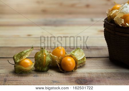 Close up Cape gooseberry on wooden background