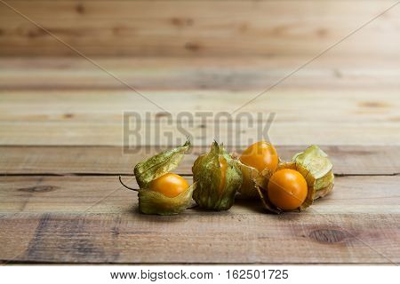 Close up Cape gooseberry on wooden background