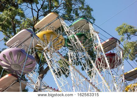 Close up of colorful ferris wheel. Detail