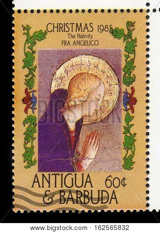 Antigua and Barbuda - CIRCA 1985: A stamp printed in Antigua and Barbuda shows Nativity by Fra Angelico, circa 1985