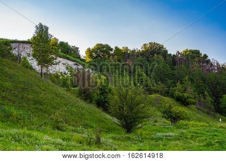 View of the chalk hill and the ancient forest archaeological monument - Krapivinskaya settlement Belgorod region Russia.