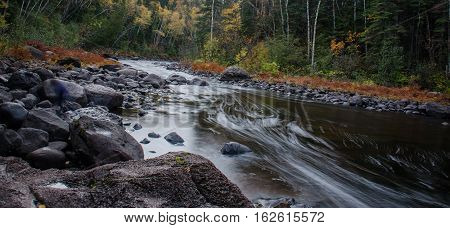 Water stream thru rocks near northshore MN