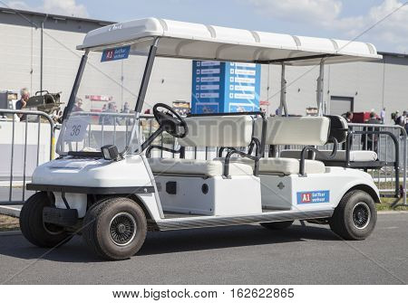 BERLIN / GERMANY - JUNE 32016: a golfcar stands on airport in berlin