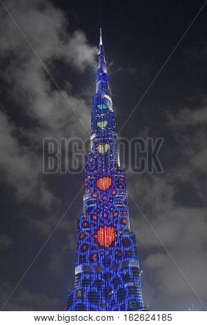 DUBAI, UAE - DEC 9: The LED lights show at Burj Khalifa in Dubai, UAE, as seen on Dec 9, 2016. The show titled Ascension, by London-based Yusuke Murakami and Tangent Design and Invention illuminated and animated the Burj Khalifa during Dubai Design Week.