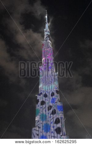 DUBAI, UAE - DEC 9: The LED lights show at Burj Khalifa in Dubai, UAE, as seen on Dec 9, 2016. The show titled Ascension, by London-based Yusuke Murakami and Tangent Design and Invention illuminated and animated the Burj Khalifa during Dubai Design Week.