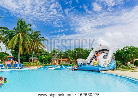 Cayo Guillermo island, Sercotel  club resort, Cuba, July 4, 2016, stunning beautiful view of hotel grounds with cozy comfortable swimming pool and people relaxing and enjoying their time