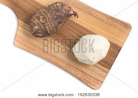 Yam Inhame Cara. Colocasia esculenta isolated on white background