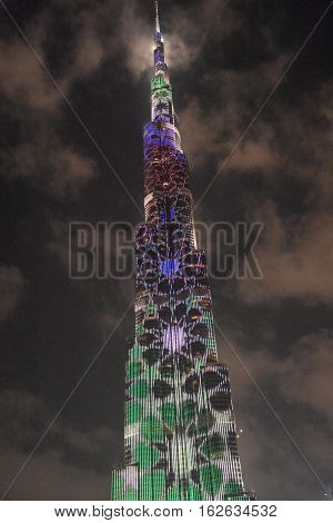 DUBAI, UAE - DEC 9: The LED lights show at Burj Khalifa in Dubai, UAE, as seen on Dec 9, 2016. The show titled Ascension, by London-based Yusuke Murakami and Tangent Design and Invention illuminated and animated the Burj Khalifa during Dubai Design Week.