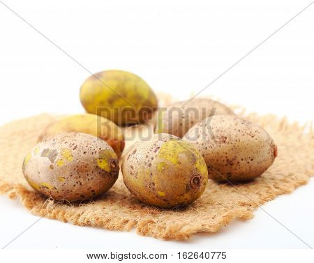 Olive fresh fruit or Spondias pinnata or hog plum fruit on white background.