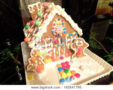 Gingerbread House Fully Decorated with Candy and Gingerbread men