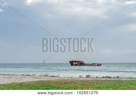 Aground Ship In A Blue Caribbean Sea