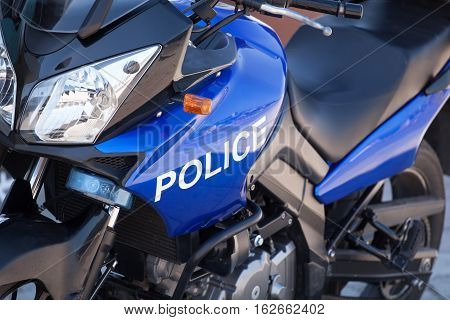 Blue modern police motorcycle on the street
