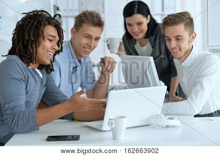 Portrait of young businesspeople working in ofiice