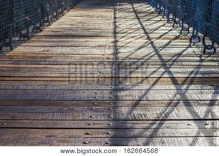 Wood bridge over the river at Thung Salaeng Luang National Park Thailand.